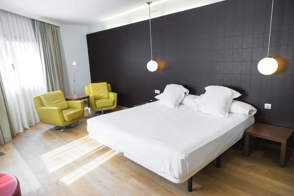 Cama o camas de una habitación en Hotel Veracruz Plaza & Spa