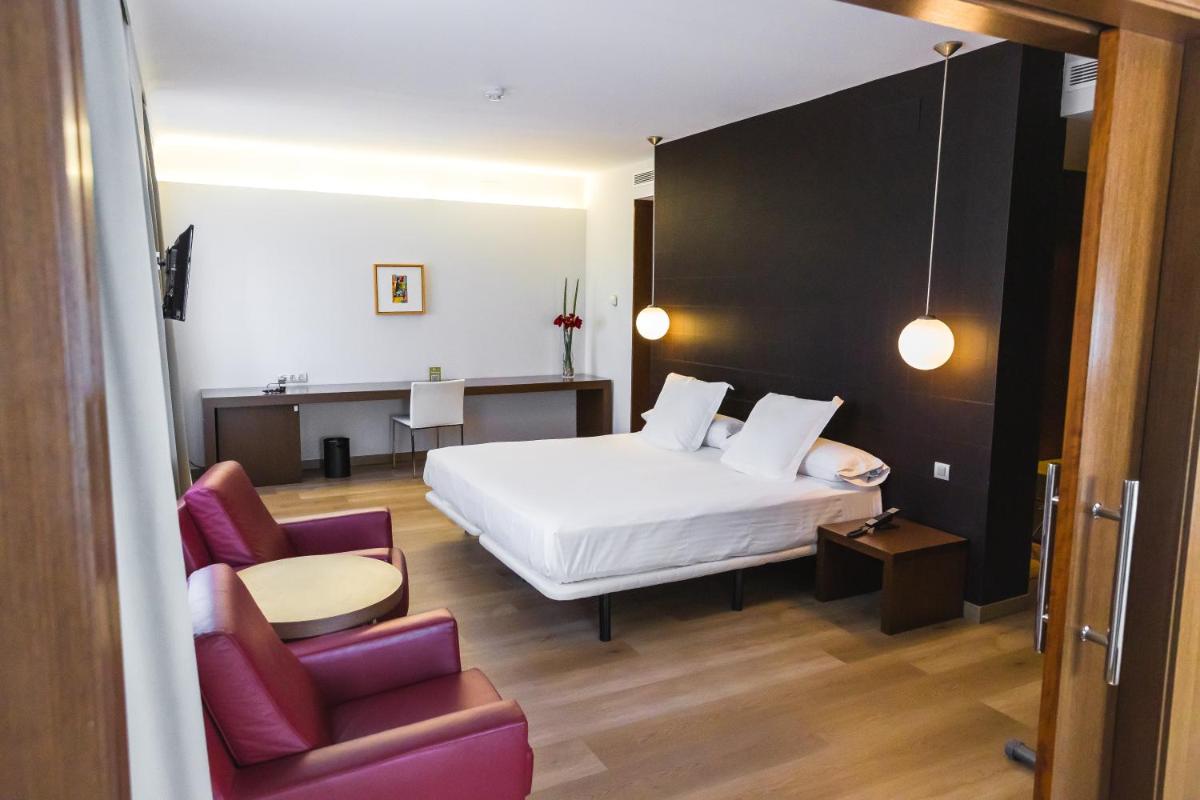 Cama o camas de una habitación en Hotel Veracruz Plaza & Spa