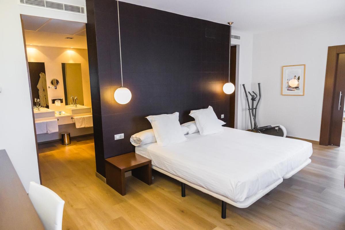 Cama o camas de una habitación en Hotel Veracruz Plaza & Spa