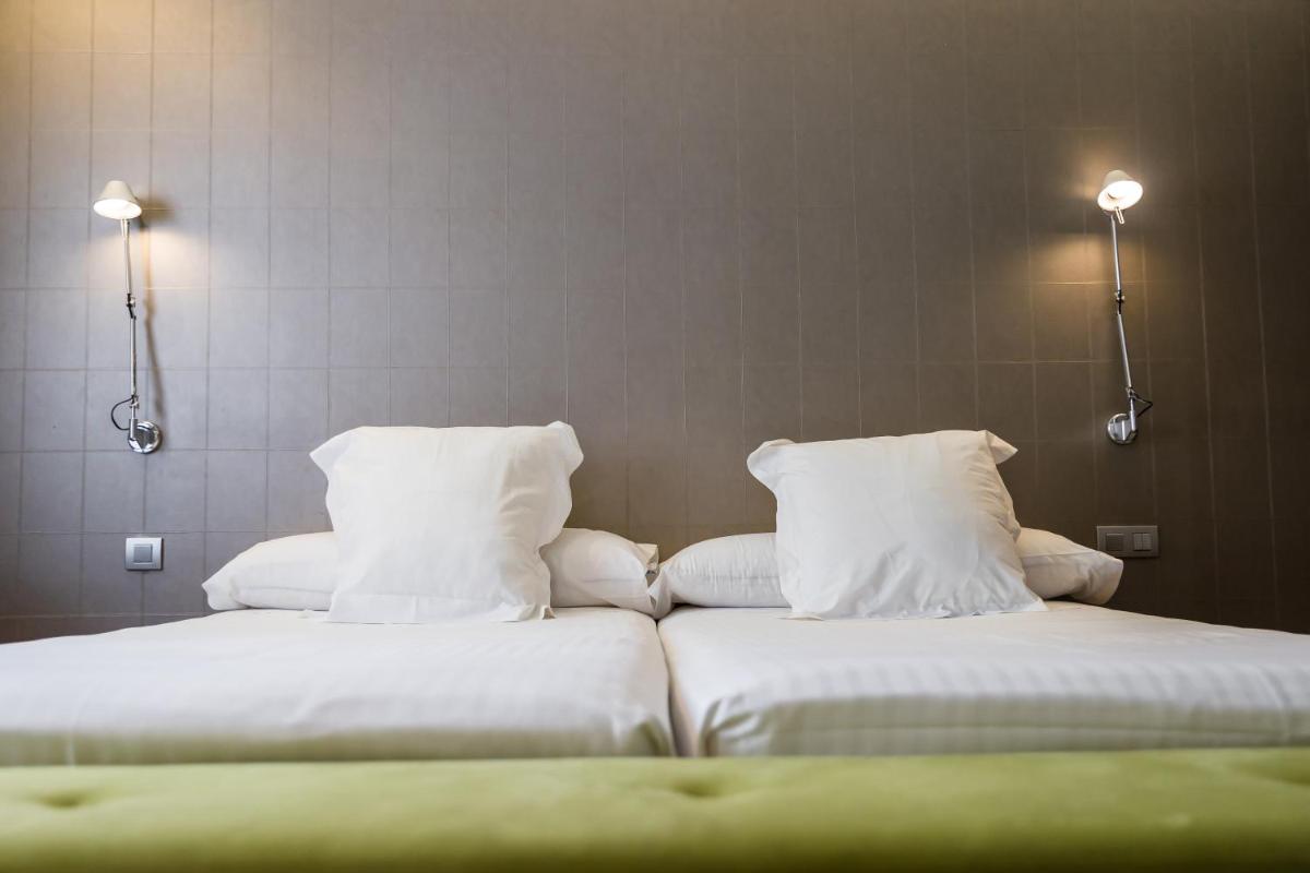 Cama o camas de una habitación en Hotel Veracruz Plaza & Spa
