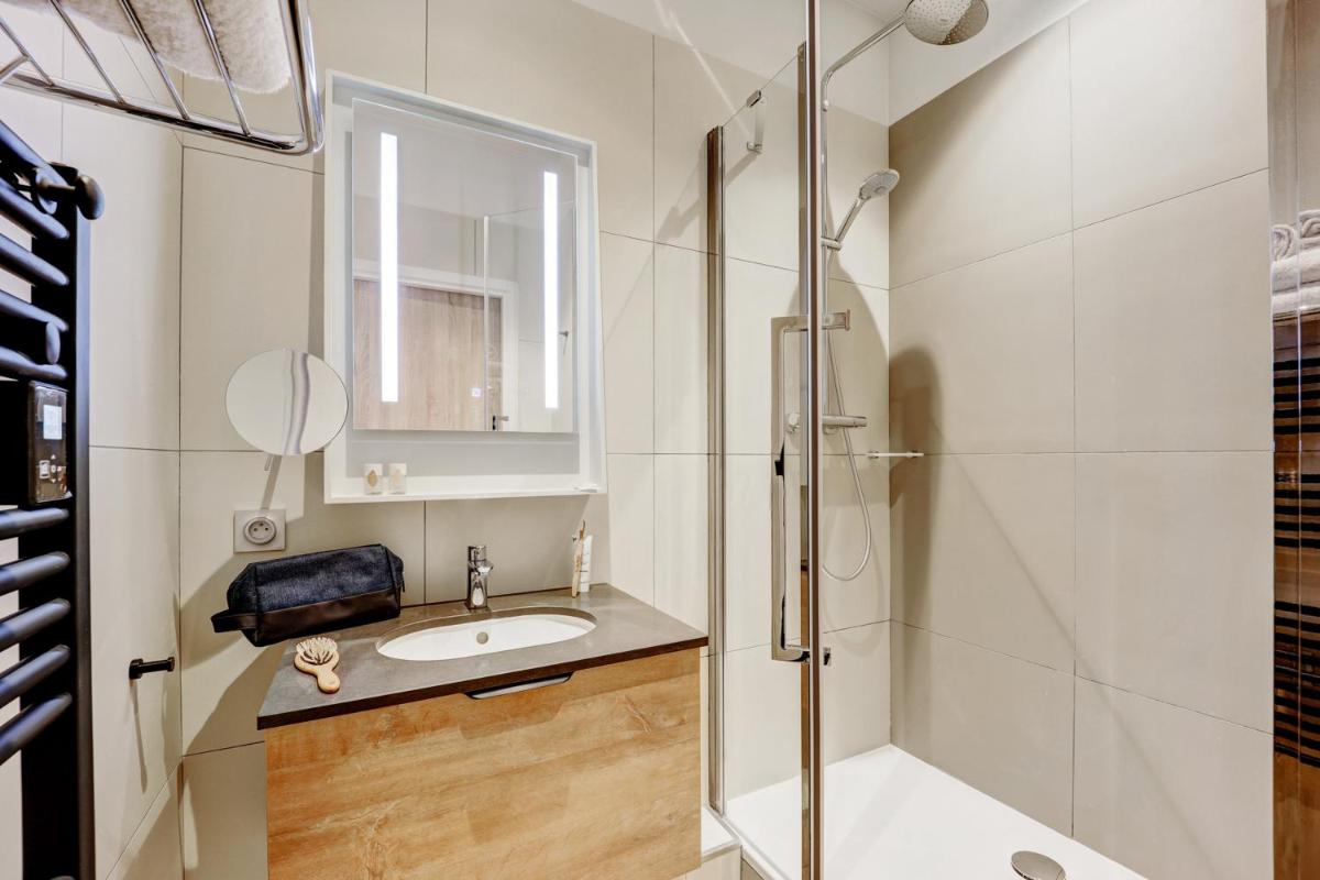 Salle de bains dans l'établissement Résidence Pierre & Vacances Premium Presqu'Ile de la Touques