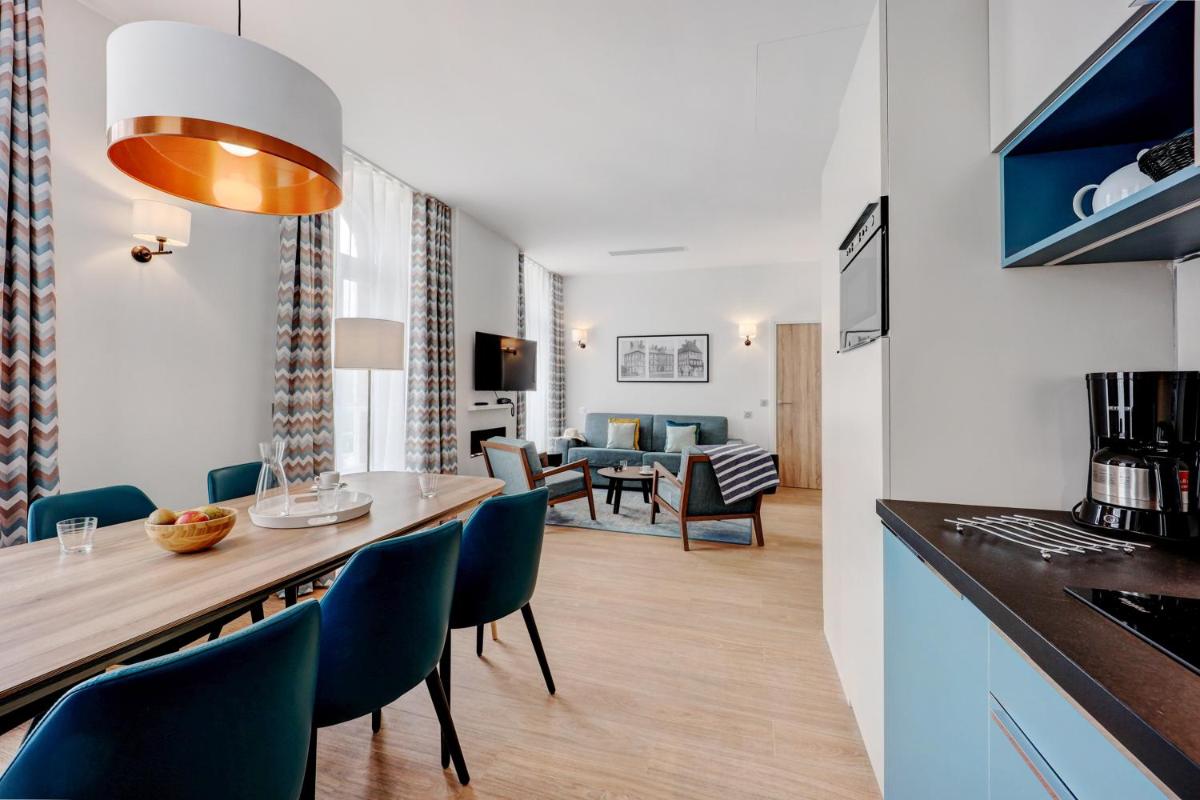 Cuisine ou kitchenette dans l'établissement Résidence Pierre & Vacances Premium Presqu'Ile de la Touques