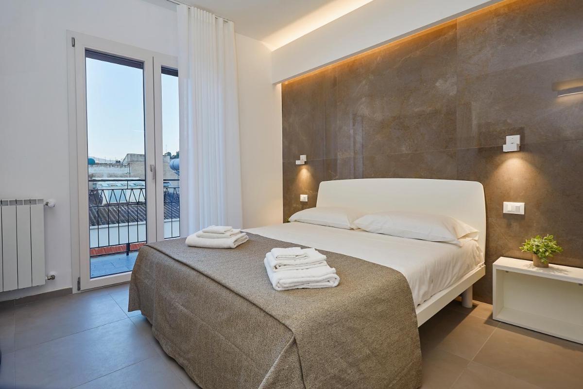 Porta del Golfo Apartments & Suites - Housity