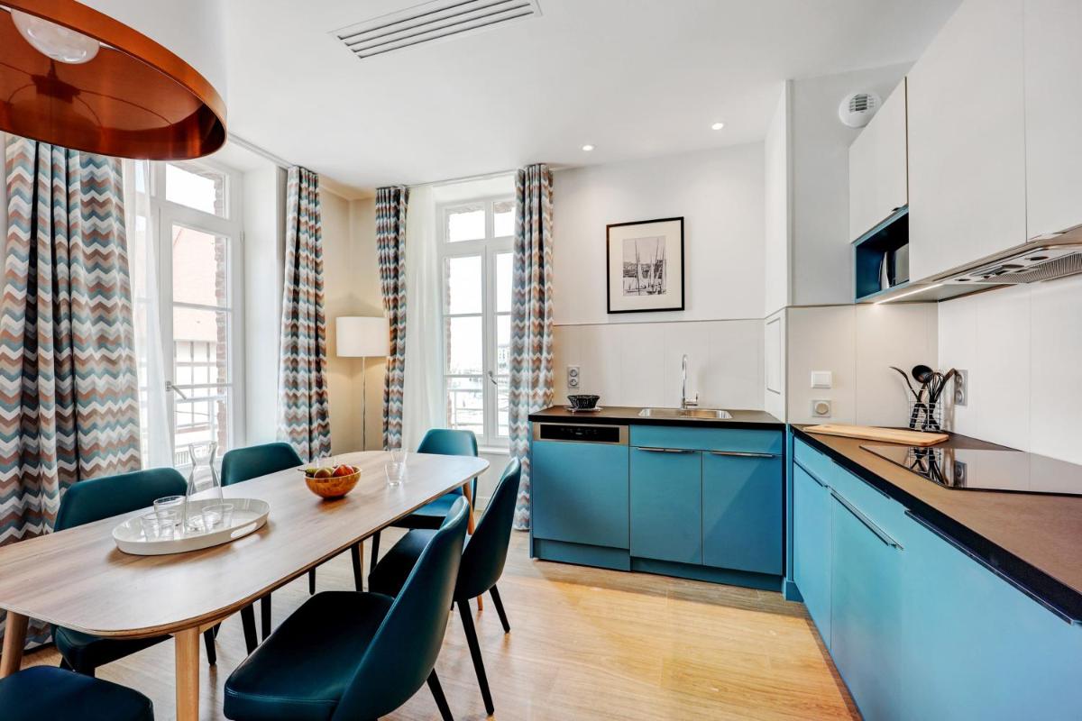 Cuisine ou kitchenette dans l'établissement Résidence Pierre & Vacances Premium Presqu'Ile de la Touques