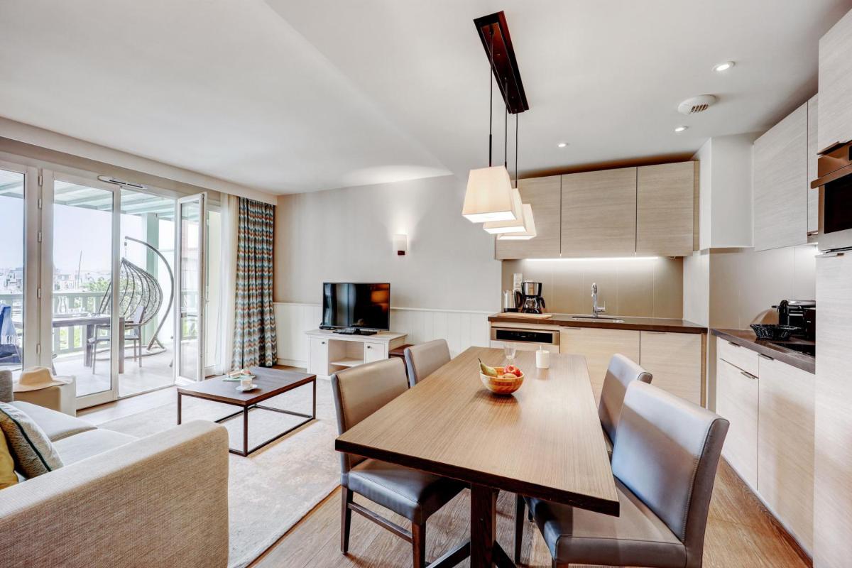 Cuisine ou kitchenette dans l'établissement Résidence Pierre & Vacances Premium Presqu'Ile de la Touques