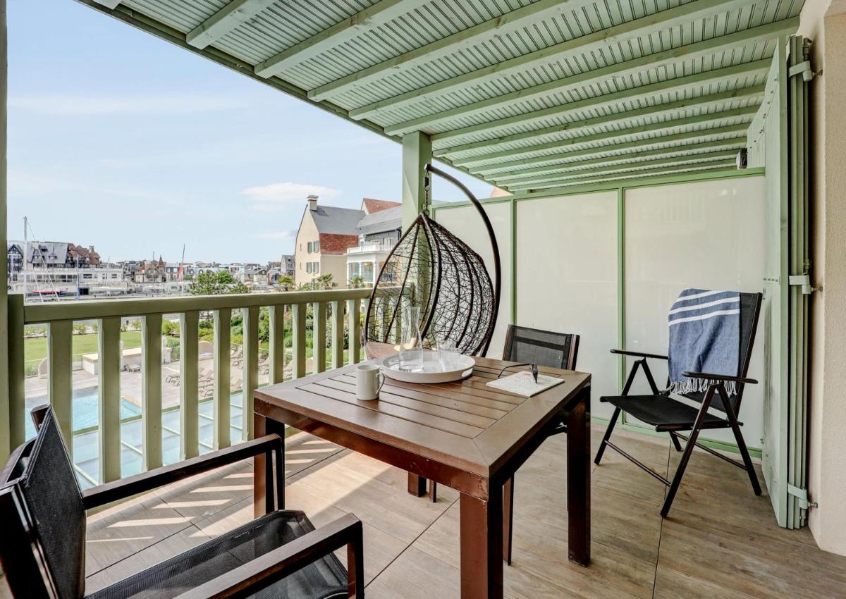 Balcon ou terrasse dans l'établissement Résidence Pierre & Vacances Premium Presqu'Ile de la Touques