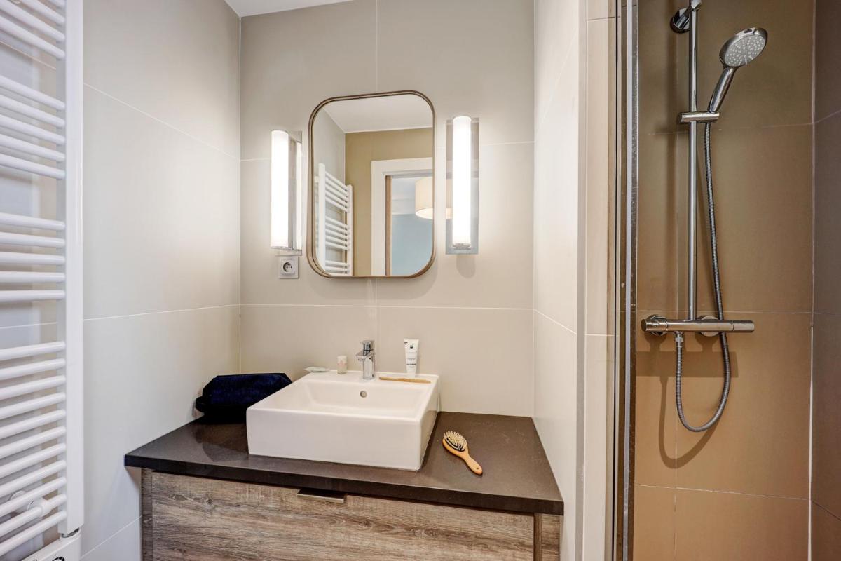 Salle de bains dans l'établissement Résidence Pierre & Vacances Premium Presqu'Ile de la Touques