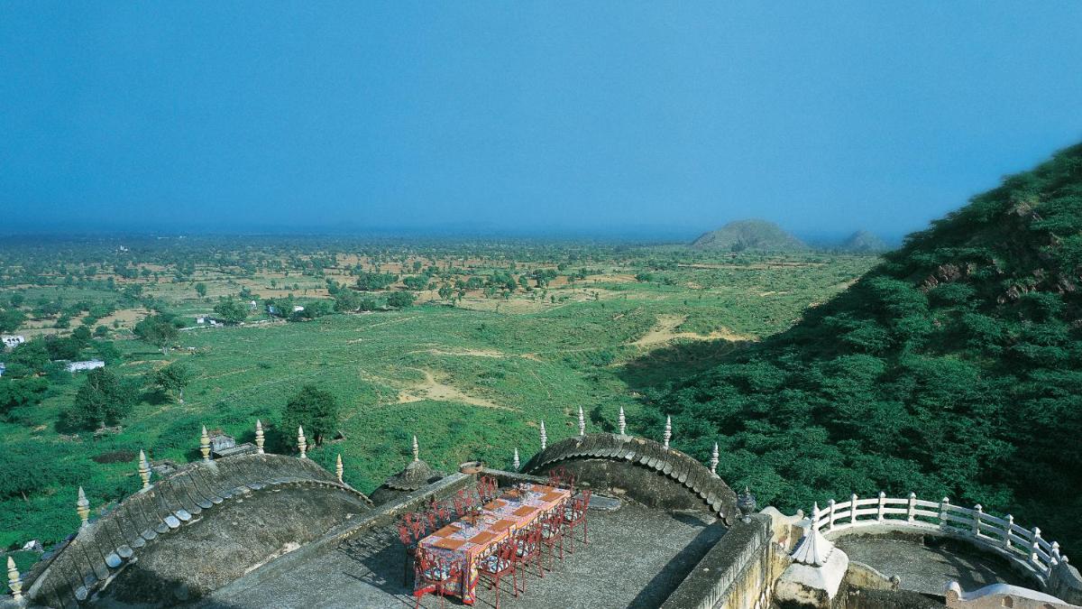 an aerial view of a mountain with two bridges at Neemrana Fort-Palace in Neemrana