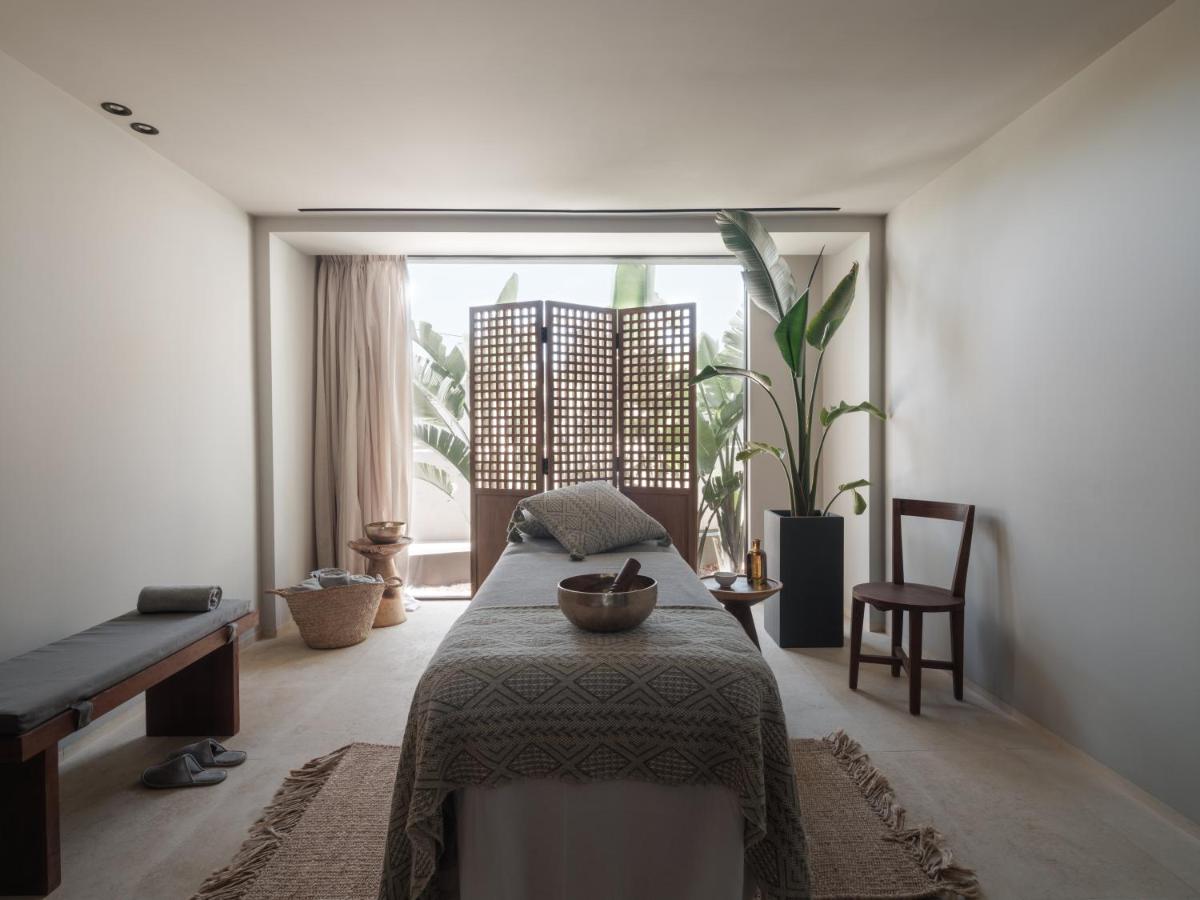 Cama o camas de una habitación en OKU Ibiza