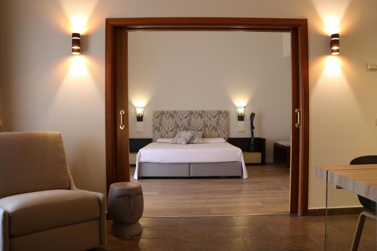 Cama o camas de una habitación en Hotel Bonalba Alicante