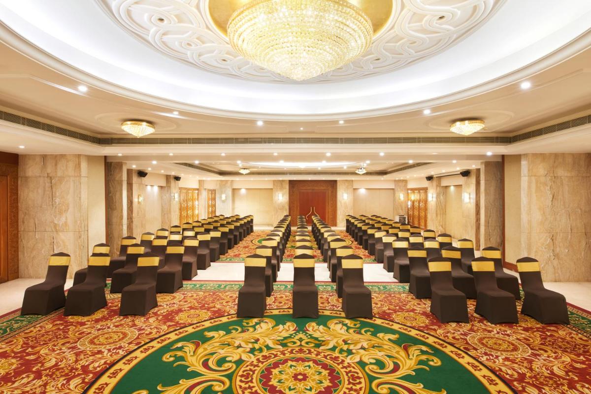 a large room with rows of chairs in it at Accord Puducherry in Puducherry