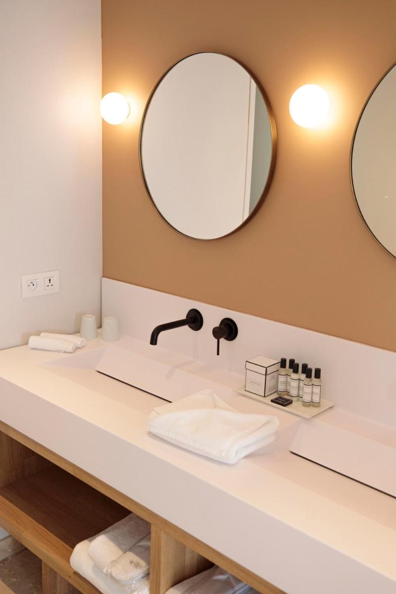 Salle de bains dans l'établissement Château L'Hospitalet Wine Resort Beach & Spa