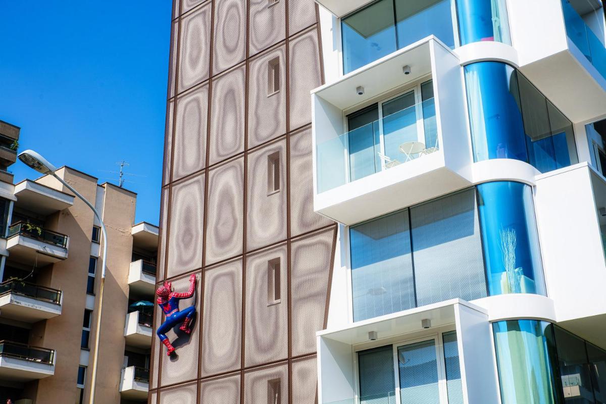 Flat Iron Apartments by Quokka 360 - modern building 5 min from the centre of Lugano - Housity