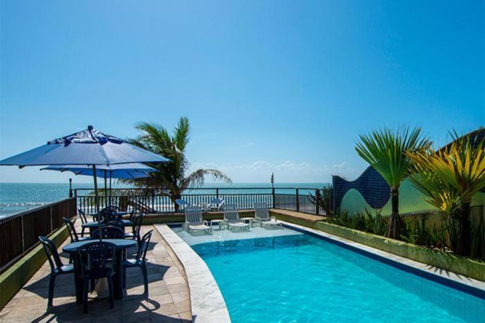 Flat completo a beira mar com vista exuberante no Blue Marlin Apartments - Housity