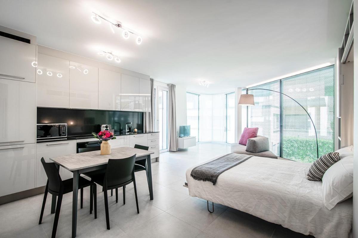 Flat Iron Apartments by Quokka 360 - modern building 5 min from the centre of Lugano - Housity