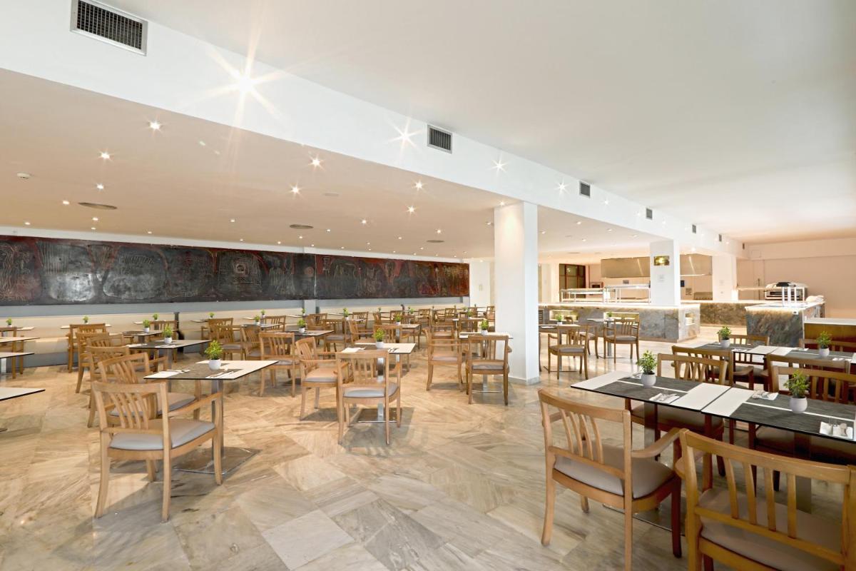 Un restaurante o sitio para comer en Sentido Fido Tucan - Adults Only