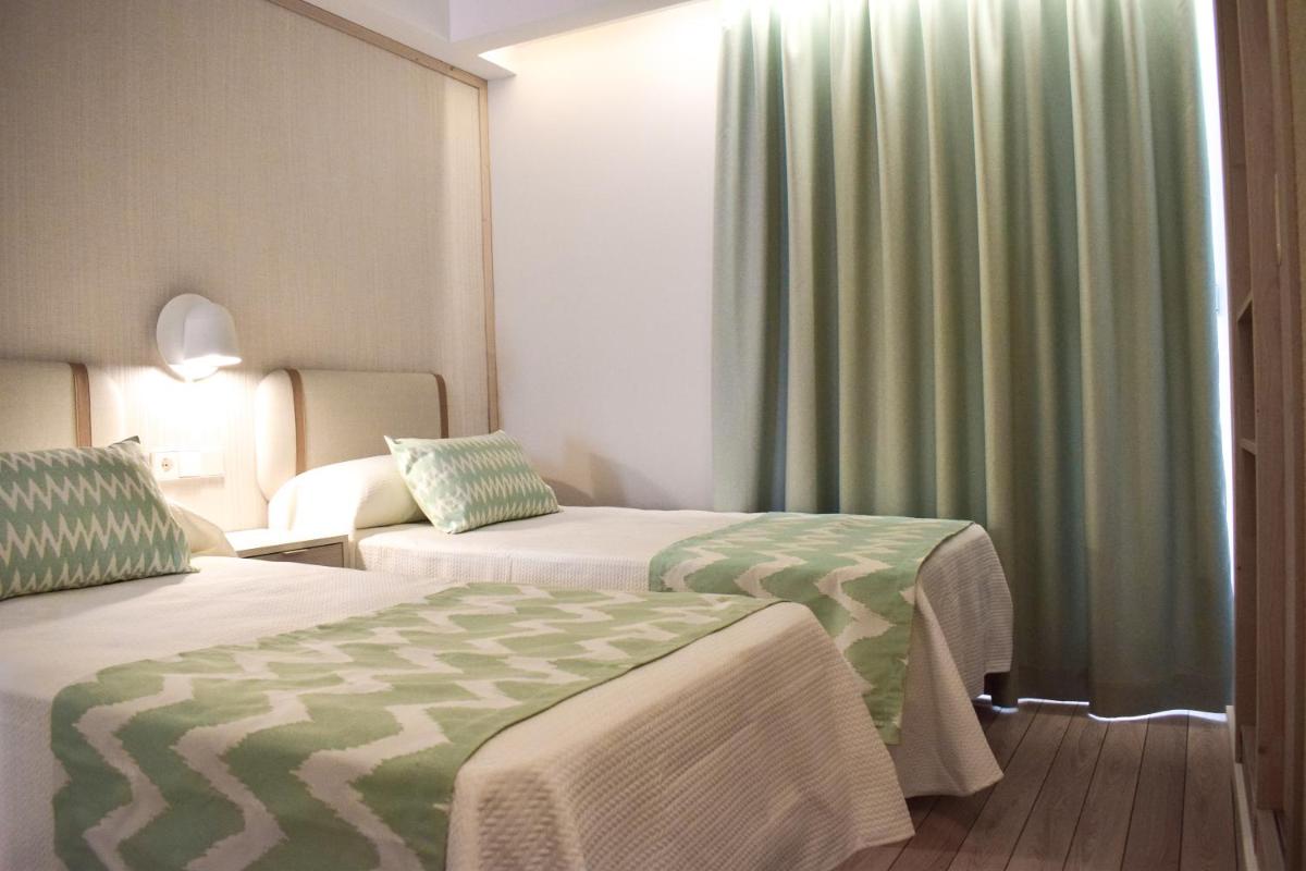 Cama o camas de una habitación en Ambassador Playa II