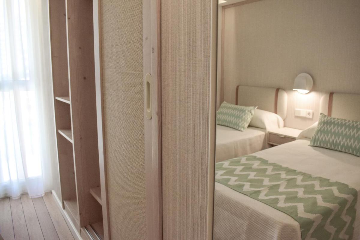 Cama o camas de una habitación en Ambassador Playa II