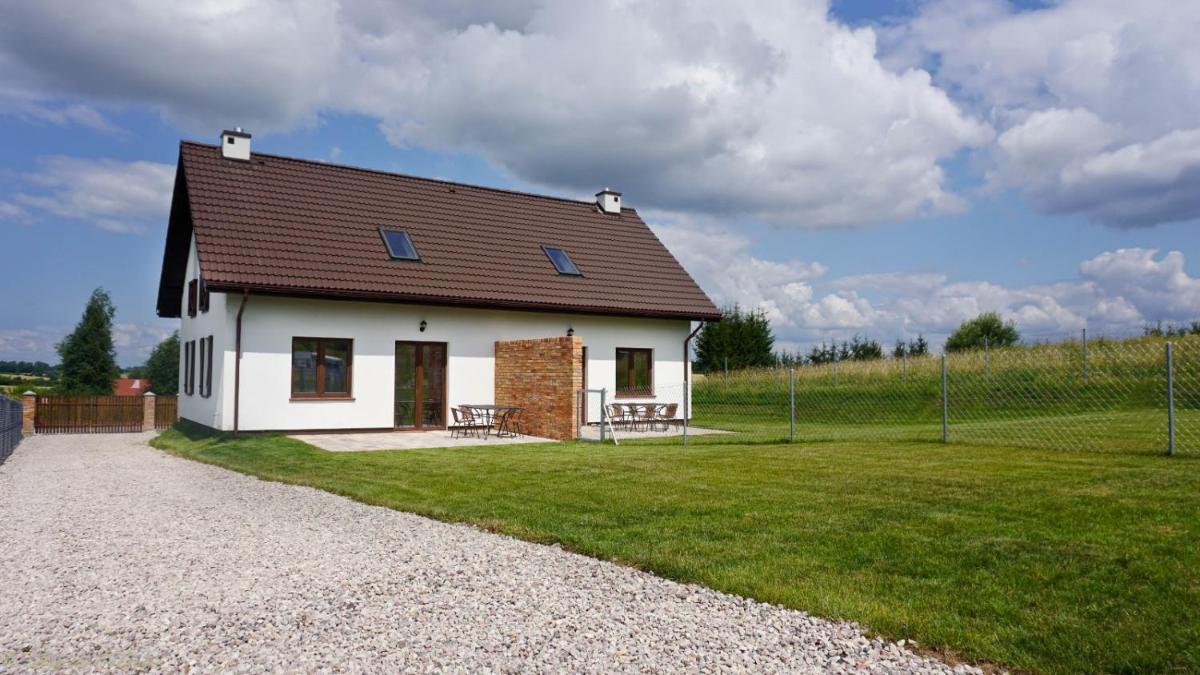 Całoroczne domki nad jeziorem Luterskim - Housity
