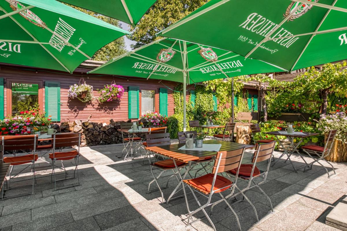 Ein Garten an der Unterkunft Wald & Schlosshotel Friedrichsruhe