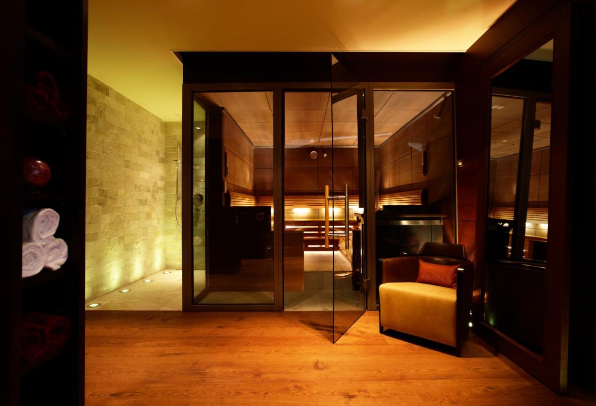 Ein Bett oder Betten in einem Zimmer der Unterkunft Wald & Schlosshotel Friedrichsruhe