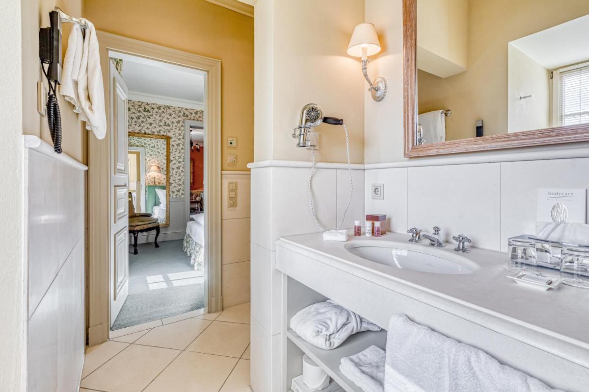 Ein Badezimmer in der Unterkunft Wald & Schlosshotel Friedrichsruhe
