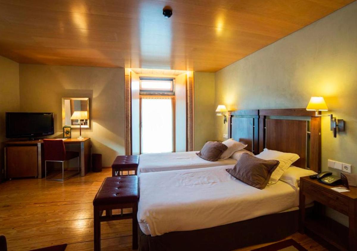 Cama o camas de una habitación en Parador de Santo Estevo