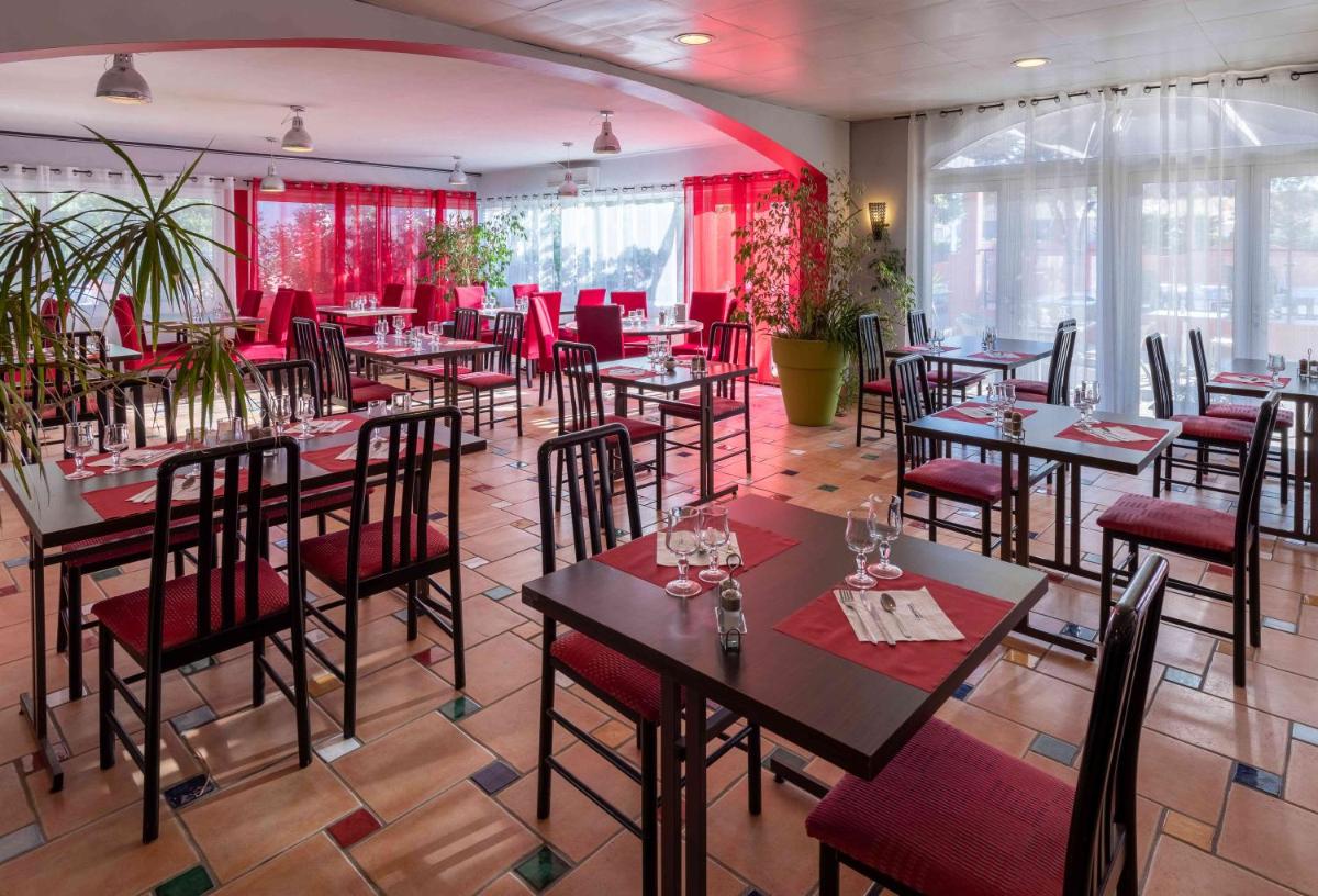 Restaurant ou autre lieu de restauration dans l'établissement Relax'Otel & Spa, Le Barcarès