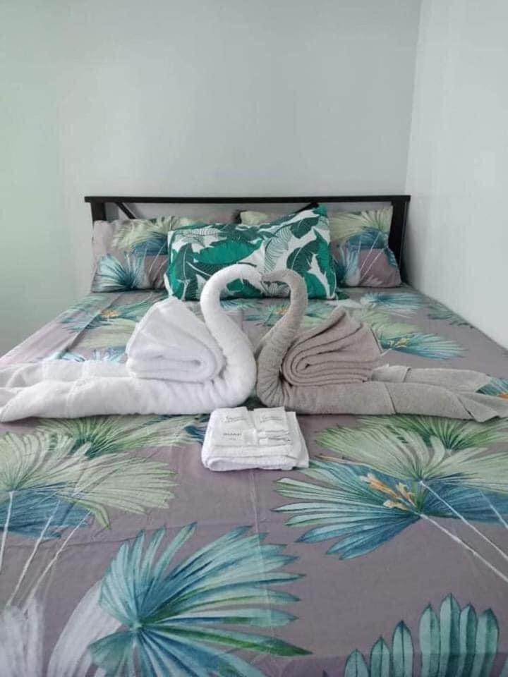 Emma and Jojo staycation condo unit in Mezza Residences - Housity