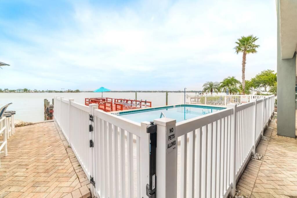 102-Tiny Treasure-Waterfront with Heated Pool - Housity