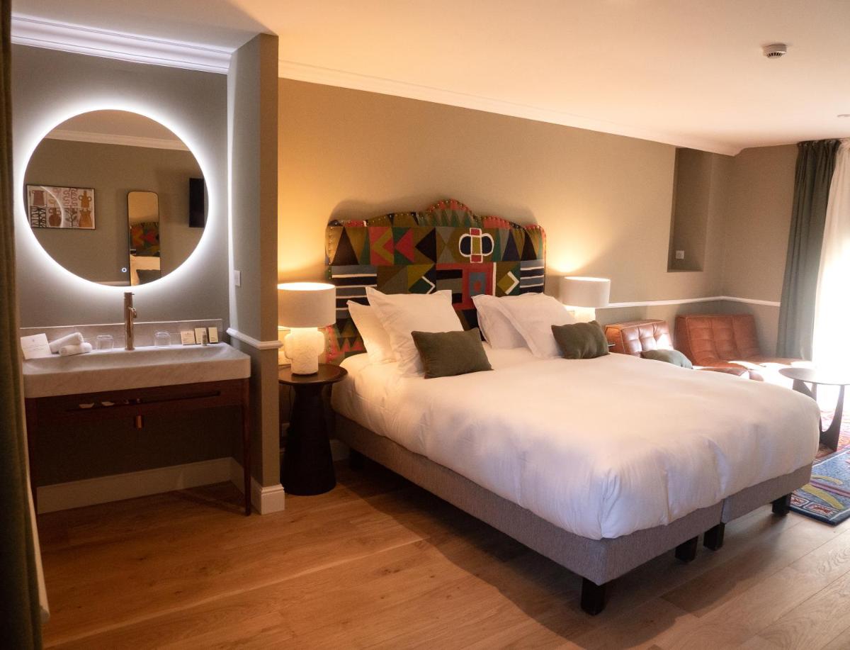 Un ou plusieurs lits dans un hébergement de l'établissement Hôtel Maison Pavlov - Restaurant & Spa - Bordeaux Bouscat