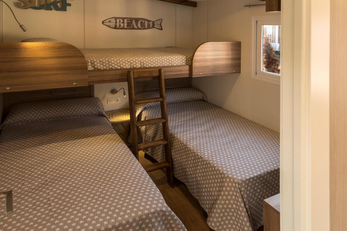Cama o camas de una habitación en Alannia Costa Blanca