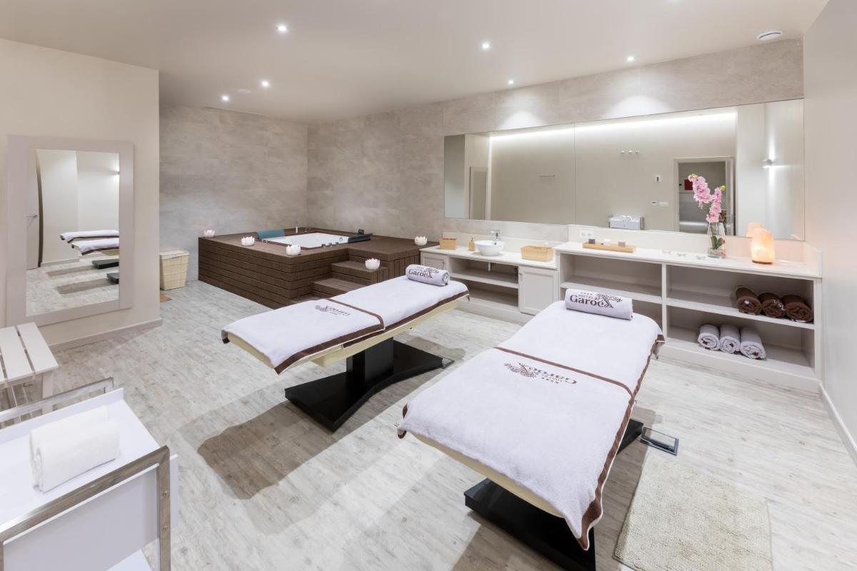 Cama o camas de una habitación en Hotel RIU Garoé