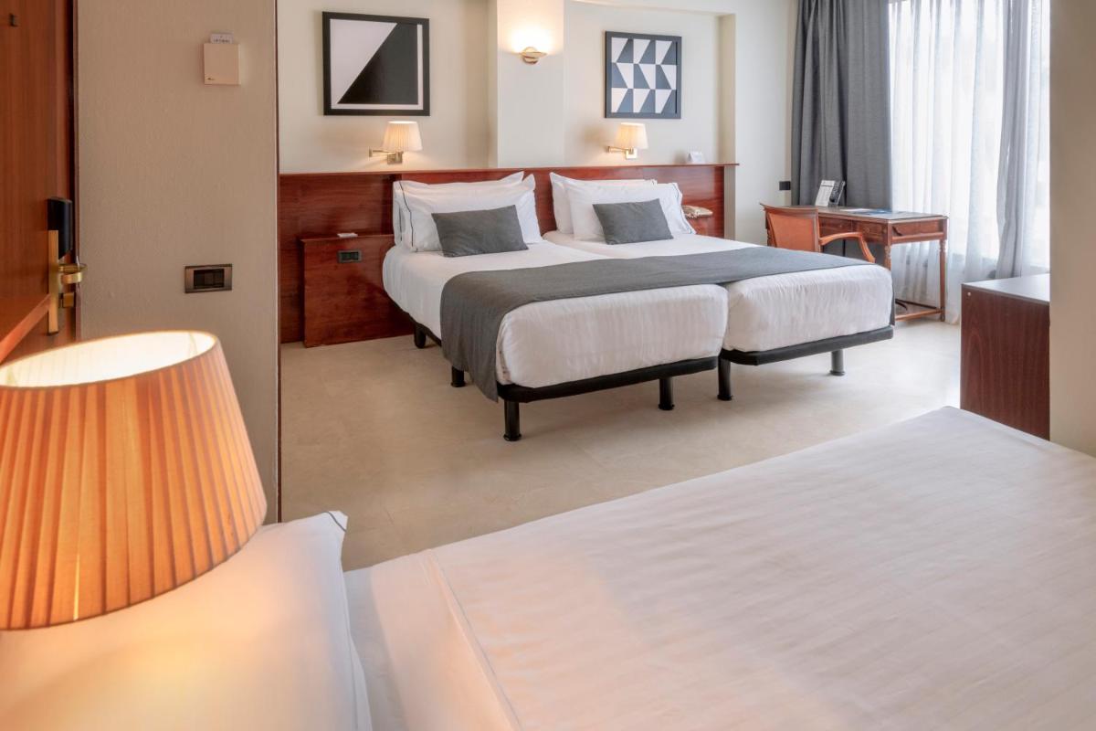 Cama o camas de una habitación en Gran Hotel Rey Don Jaime