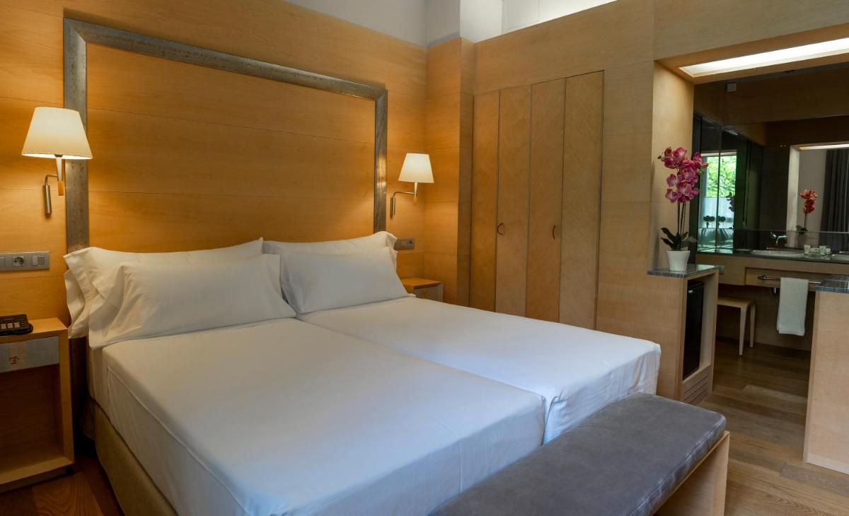 Cama o camas de una habitación en Gran Hotel – Balneario de Panticosa