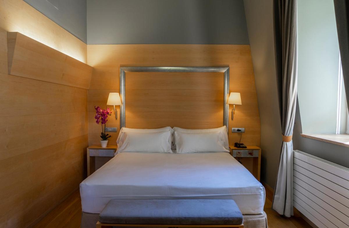 Cama o camas de una habitación en Gran Hotel – Balneario de Panticosa