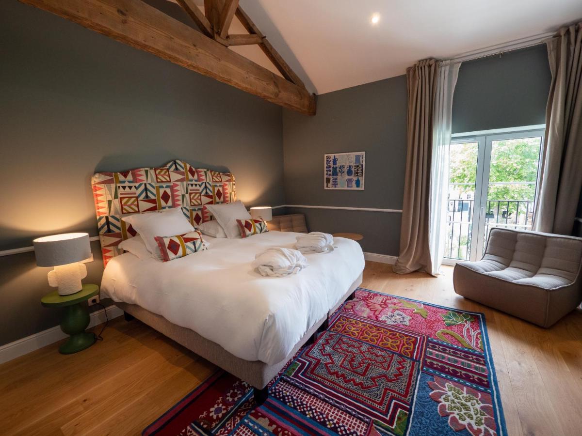 Un ou plusieurs lits dans un hébergement de l'établissement Hôtel Maison Pavlov - Restaurant & Spa - Bordeaux Bouscat