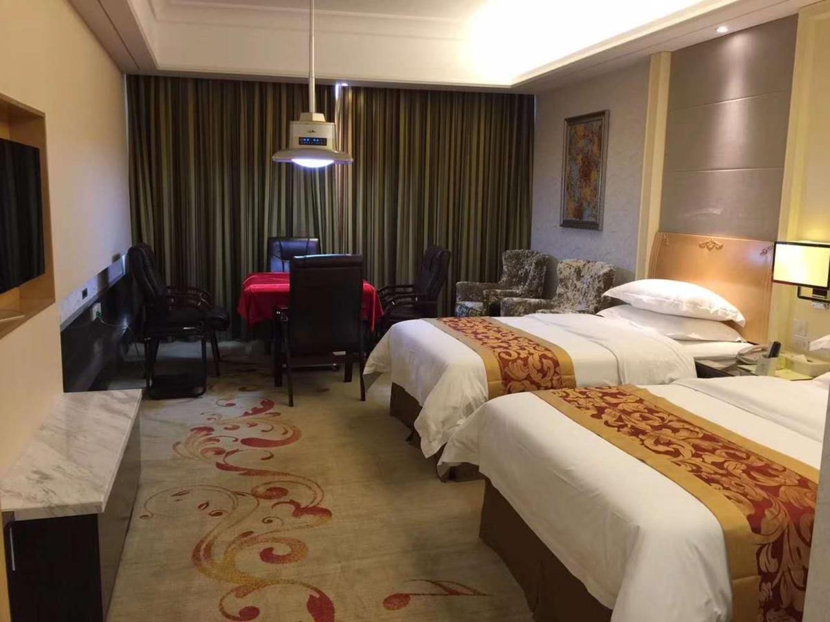 Vienna Hotel Jiangmen Heshan Huamao - Housity
