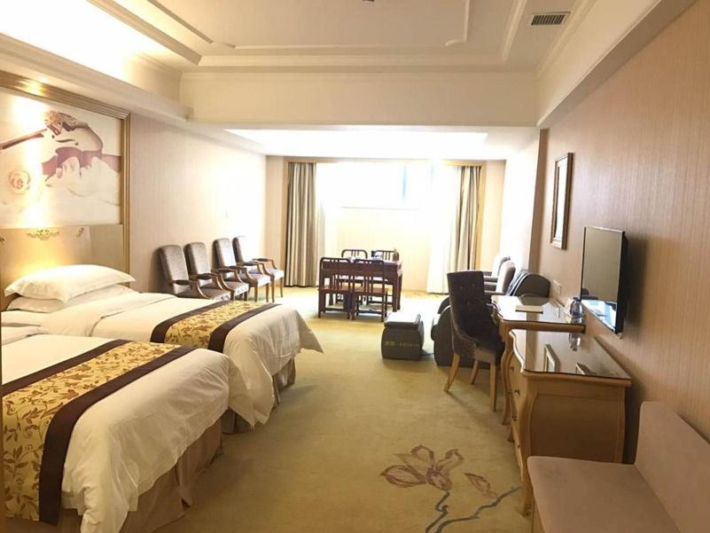 Vienna International Hotel Shanghai Pujiang Town - Housity