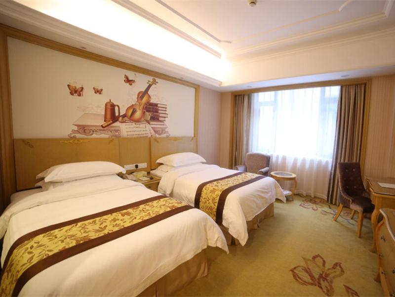 Vienna International Hotel Shanghai Pujiang Town - Housity