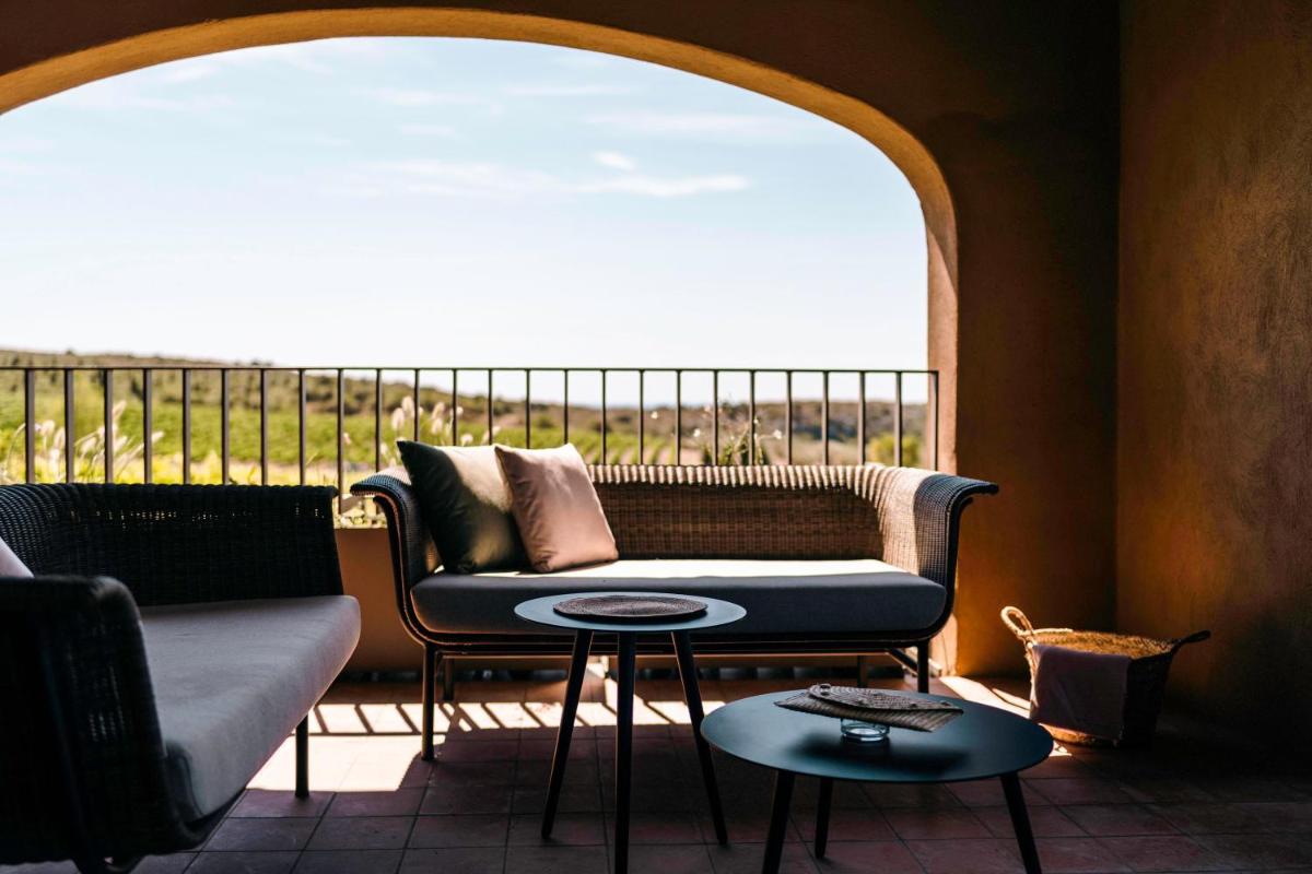 Coin salon dans l'établissement Château L'Hospitalet Wine Resort Beach & Spa