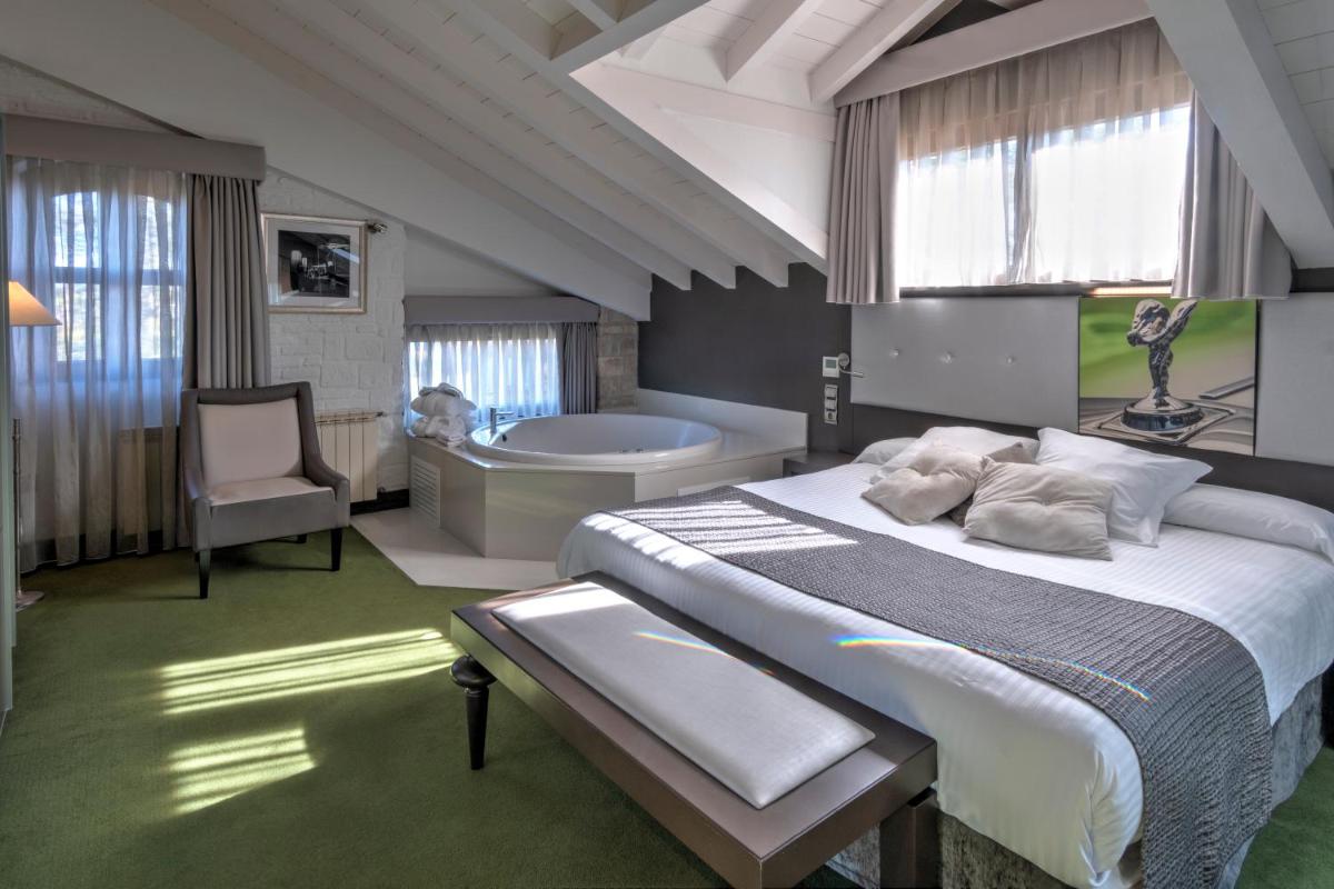 Cama o camas de una habitación en Costa Esmeralda Suites