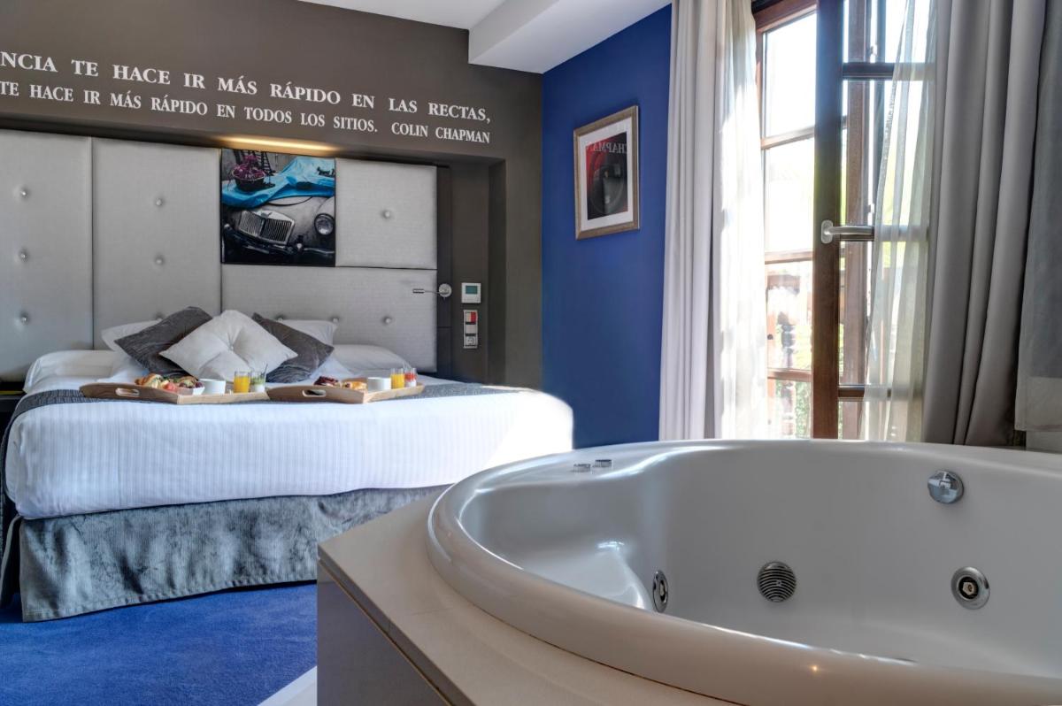 Cama o camas de una habitación en Costa Esmeralda Suites