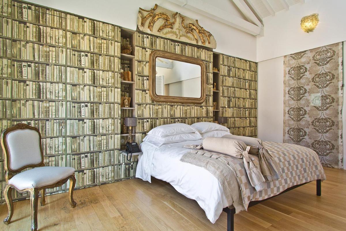 Uma cama ou camas num quarto em Torre de Palma Wine Hotel, Monforte, a Member of Design Hotels