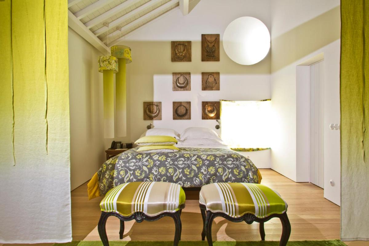 Uma cama ou camas num quarto em Torre de Palma Wine Hotel, Monforte, a Member of Design Hotels