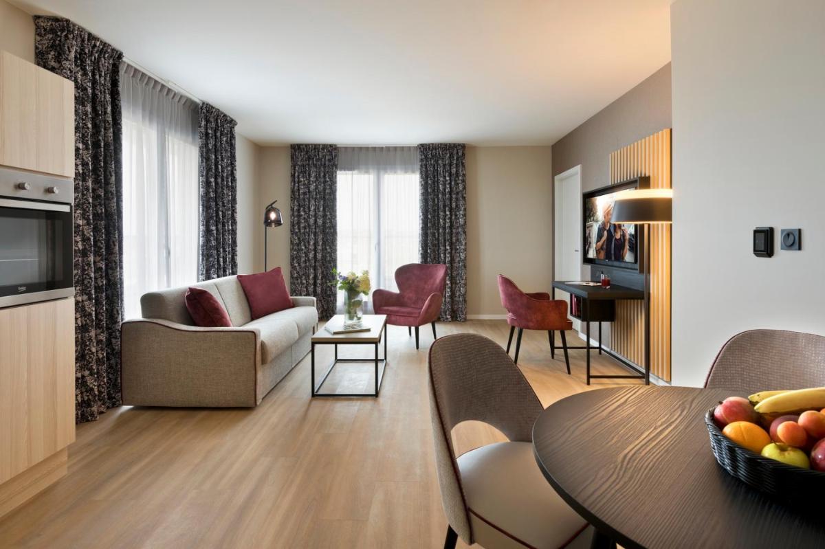 Coin salon dans l'établissement Citadines Eurometropole Strasbourg