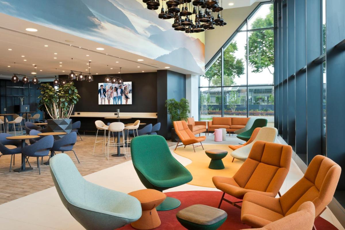 Coin salon dans l'établissement Citadines Eurometropole Strasbourg