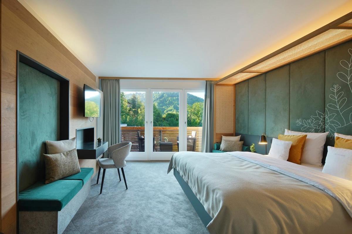 Ein Bett oder Betten in einem Zimmer der Unterkunft Das Tegernsee