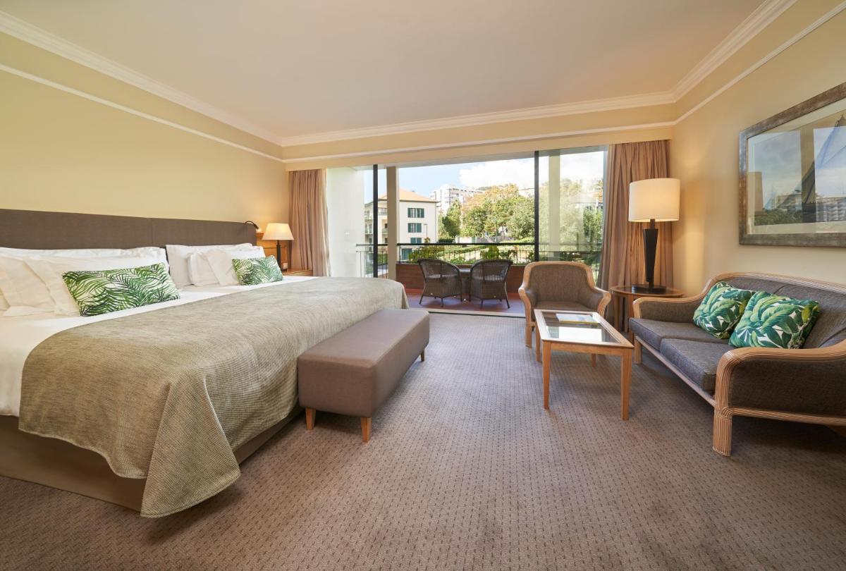 Uma cama ou camas num quarto em The Cliff Bay - PortoBay