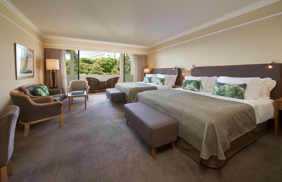 Uma cama ou camas num quarto em The Cliff Bay - PortoBay